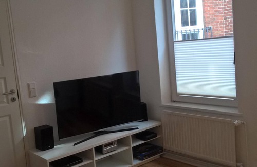 Flensburg Apartment | Located in the heart of Flensburg, in an alley next to the pedestrian zone