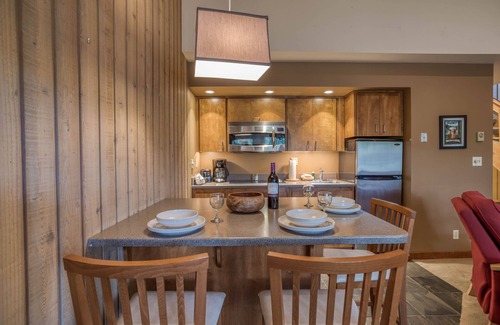 Century West Condo | Location and Privacy in This Upper-Level Condo with Extra Amenities!