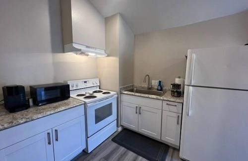 Rincon Heights House | Location! Location! Carraige House with Parking!