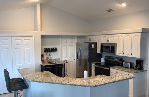 Punta Gorda House | LOCATION! Modern waterfront home;1-block to FishermanVillage; HEATED SALT POOL