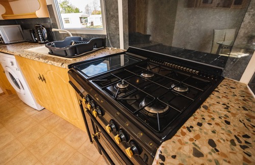 Forfar Ski Chalet | Lochlands 2br family caravan - pets-play park