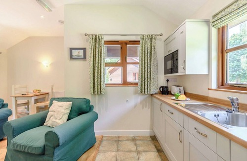 Kilcot Ski Chalet | Lodge with one king-size double with en suite shower.
