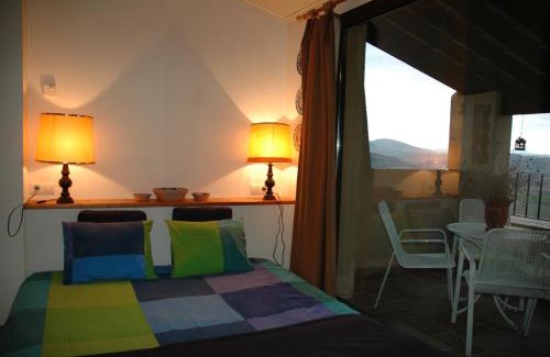 Montsonis Apartment | Loft con chimenea y terraza con vistas - Cal Caterino