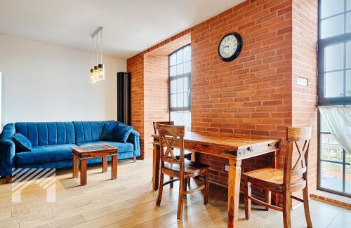 Lodz Apartment | Loft Marmurowy by LookAp