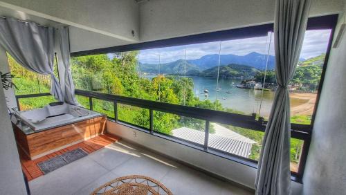 Biscaia Apartment | Loft Praia da Tartaruga com Hidromassagem