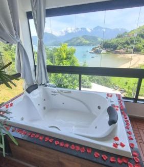 Biscaia Apartment | Loft Praia da Tartaruga com Hidromassagem