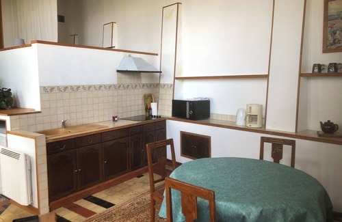 Cote Est Soquence Apartment | Loft-style apartment in a former orangery.