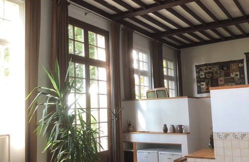 Cote Est Soquence Apartment | Loft-style apartment in a former orangery.