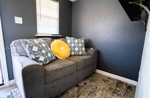 Brazoria Cabin | Lofted Cabin w/ 2 beds! Large walk-in shower & ktichen - Short walk to the river