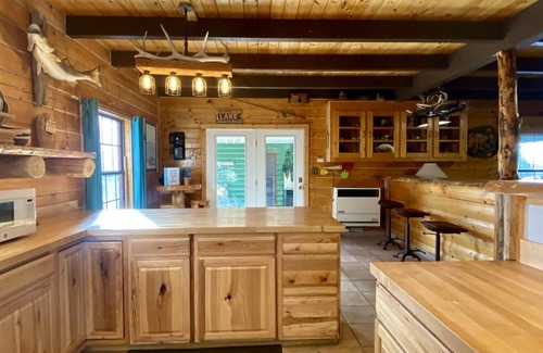 Elephant Butte House | Log Cabin at the lake