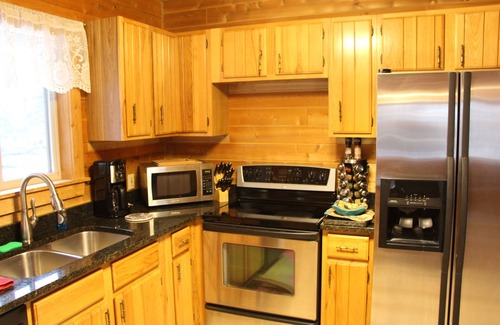 Indian River Cabin | Log Cabin home on the Sturgeon River in Indian River