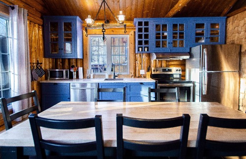 Saint-Raymond Ski Chalet | Log cabin located on a private island.