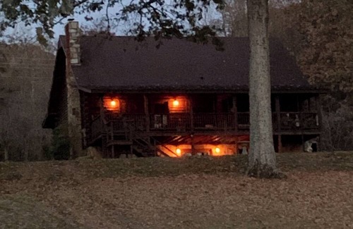 Livingston County Cabin | Log cabin w/walk out basement and loft located on Ohio Rivers edge.
