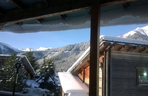 Hohentauern House | Log cabin with breathtaking mountain views through the changing seasons