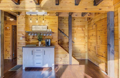 Cedarhurst Cabin | Log Cabin with living room fireplace and hot tub