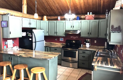 Condon Cabin | Log Cabin with Stunning Mountain Views near Swan River and Holland Lake.