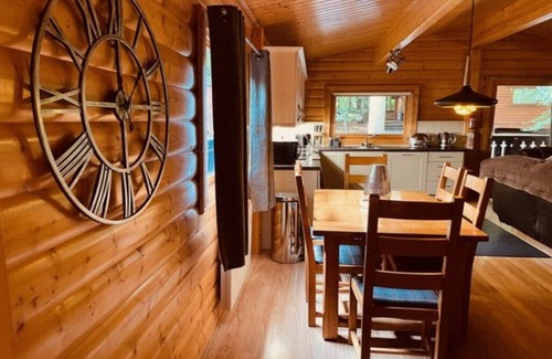 Kenwick Cabin | Log cabin with veranda, nestled in Kenwick Park, Louth