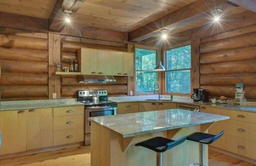 Lac Superieur Village Ski Chalet | Log Cottage Resort Access & Spa