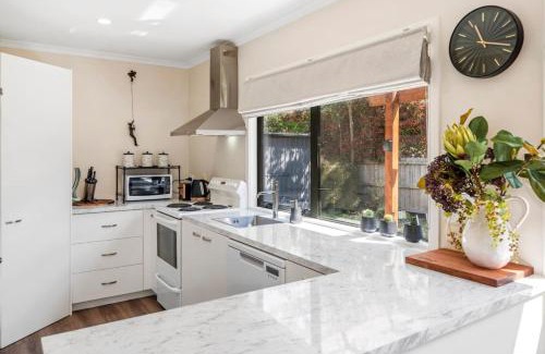 Wharewaka House | Logan House, Stylish Getaway With BBQ and Yard