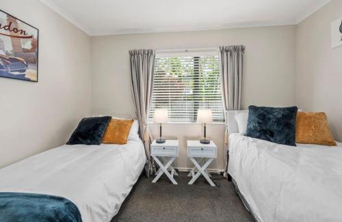Wharewaka House | Logan House, Stylish Getaway With BBQ and Yard
