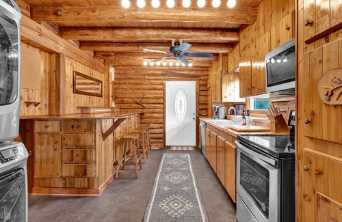 Mayhew Cabin | “Logged Out”- Log Cabin Rental