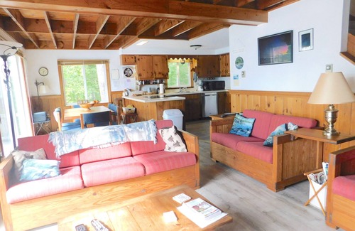 Naples Ski Chalet | Long Lake chalet and guest house with 200' of water frontage and sunset views