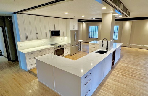 Regina Condo | LONG TERM Luxury Penthouse Loft in Historic Western Trust Building!