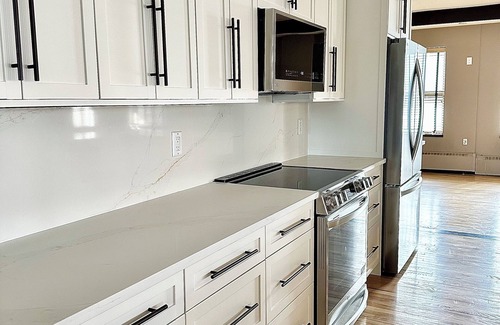 Regina Condo | LONG TERM Luxury Penthouse Loft in Historic Western Trust Building!