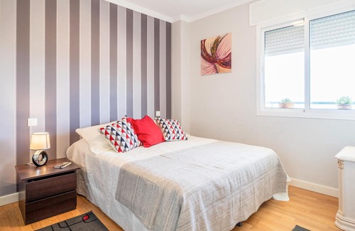 Benagalbon Apartment | Look forward to this family-friendly and colorful vacation apartment with sea view.