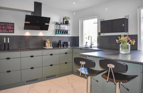 Hollviken House | Look forward to a relaxing vacation in this vacation home not far from the sea.