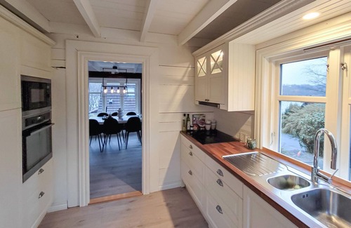 Tysvaer House | Look forward to a relaxing vacation in this vacation home with fjord view.