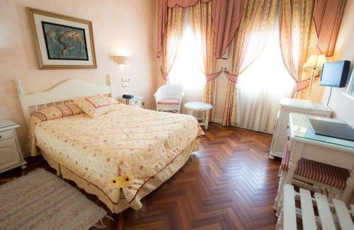 Dosbarrios Hotel | Los Arcos