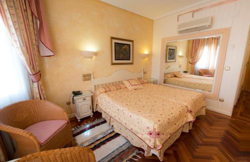 Dosbarrios Hotel | Los Arcos