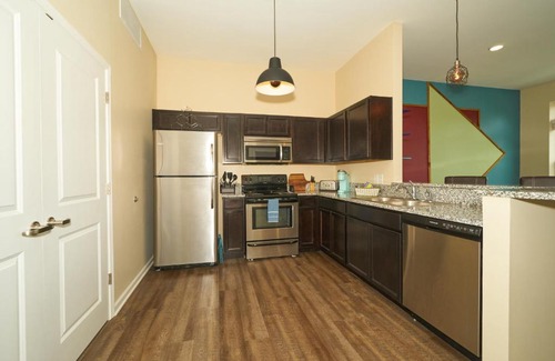 Fall Creek Place House | Lovely 1-Bedroom apartment w free parking garage