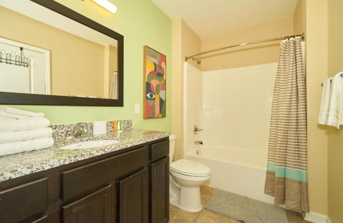 Fall Creek Place House | Lovely 1-Bedroom apartment w free parking garage