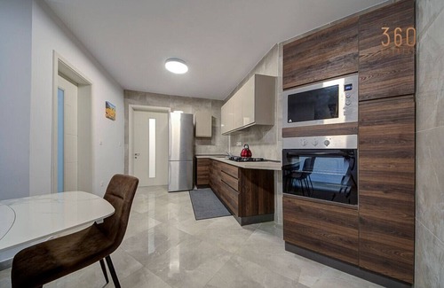 Gzira Apartment | Lovely 2BR home with Backyard & Sofabed in Gzira