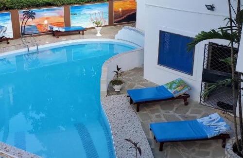 Galu Beach Villa | Lovely 3 Bed room Villa in Diani Beach with pool