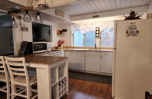 Treasure Lake House | Lovely 3 BR 2-Bath home. Short walk to beach access. Private backyard.