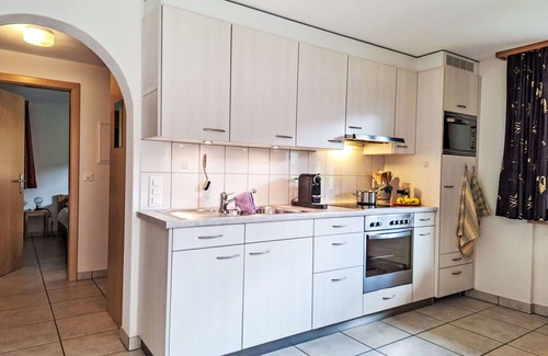 Kandersteg Apartment | Lovely apartment for 4 people with WIFI, TV, balcony, pets allowed, panoramic view and parking