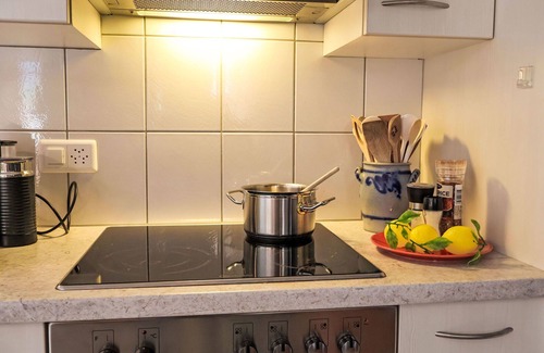 Kandersteg Apartment | Lovely apartment for 4 people with WIFI, TV, balcony, pets allowed, panoramic view and parking