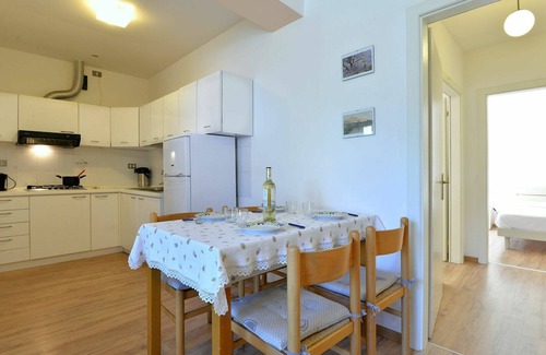 Caldonazzo Apartment | Lovely apartment for 4 people with WIFI, TV, patio, pets allowed and parking