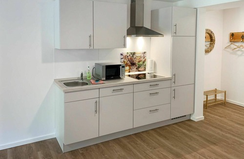 Holtriem Apartment | Lovely apartment for 3 guests with WIFI, TV, terrace and parking