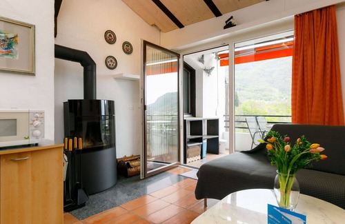 Capriasca Apartment | Lovely apartment for 4 people with WIFI, pool, TV, patio and panoramic view