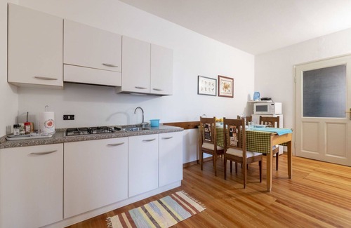 Vito d'Asio Apartment | Lovely apartment for 4 people with WIFI, pool, TV, patio, pets allowed and parking