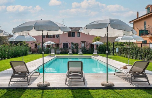Caramagna Ligure Apartment | Lovely apartment for 4 guests with pool, WIFI, A/C, TV, terrace, pets allowed and parking