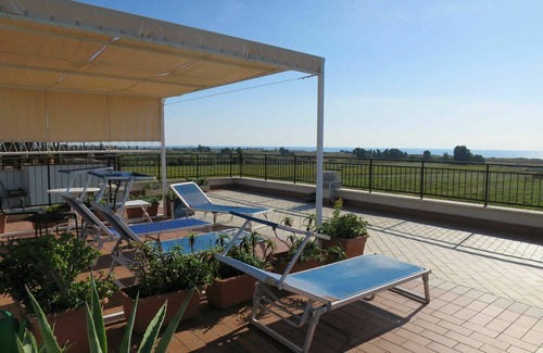 Cerveteri Apartment | Lovely apartment for 5 people with A/C, TV, patio and parking