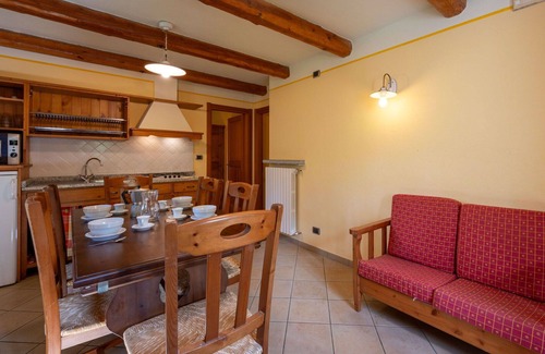 Sampeyre Apartment | Lovely apartment for 4 people with WIFI, pool, TV, terrace and parking