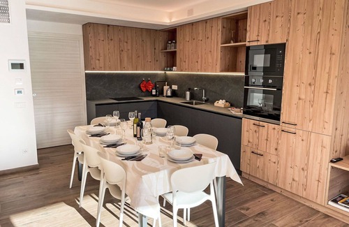 Bianzone House | Lovely apartment in villa for 8 guests with A/C, WIFI, TV, terrace and pets allowed