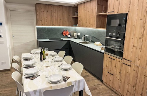 Bianzone House | Lovely apartment in villa for 8 guests with A/C, WIFI, TV, terrace and pets allowed