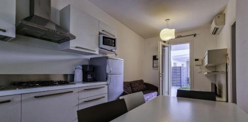 Bibione Lido del Sole Apartment | Lovely apartment overlooking the pool in Bibione